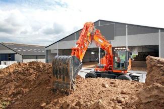 Bageri na kotačima Doosan DX160W-3