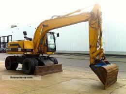 Bageri na kotačima Caterpillar M 315 Mono
