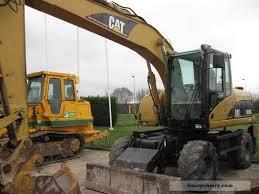 Bageri na kotačima Caterpillar M 316 C Mono