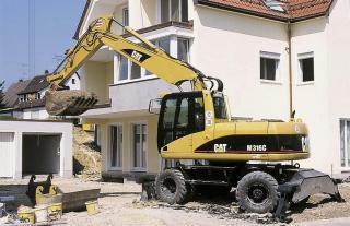 Bageri na kotačima Caterpillar M 316 C Mono