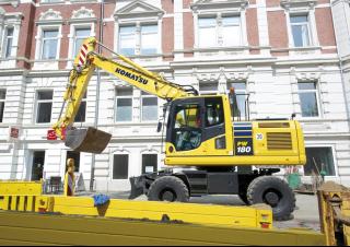 Bageri na kotačima Komatsu PW180-10