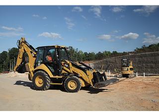 Rovokopači-utovarivači Caterpillar 420F