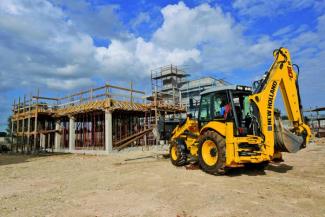 Rovokopači-utovarivači New Holland B110C PS