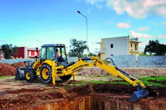 Rovokopači-utovarivači New Holland B110C PS