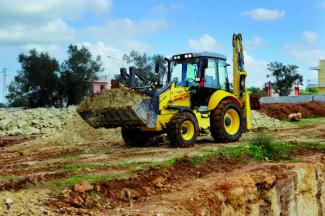 Rovokopači-utovarivači New Holland B110C PS