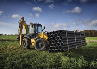 Rovokopači-utovarivači New Holland B115C