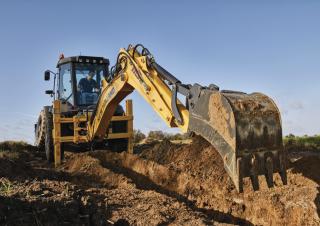 Rovokopači-utovarivači New Holland B115C