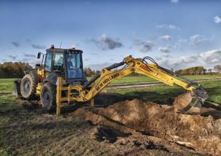 Rovokopači-utovarivači New Holland B115C