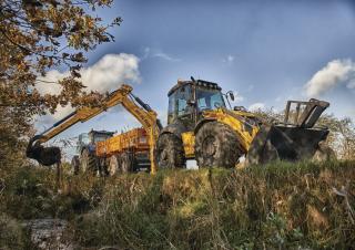 Rovokopači-utovarivači New Holland B115C