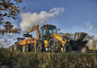 Rovokopači-utovarivači New Holland B115C