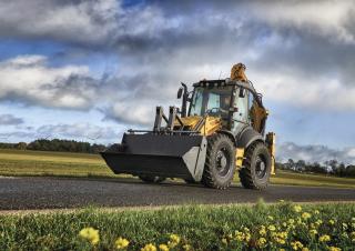 Rovokopači-utovarivači New Holland B115C