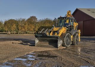 Rovokopači-utovarivači New Holland B115C