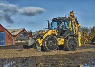 Rovokopači-utovarivači New Holland B115C