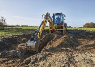 Rovokopači-utovarivači New Holland B115C