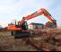 Bageri na kotačima Doosan DX 140 W