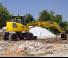 Bageri na kotačima Komatsu PW98MR-10