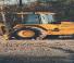 Rovokopači-utovarivači John Deere Construction 710 B