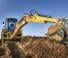 Rovokopači-utovarivači New Holland B115C