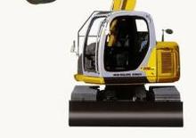 Bageri gusjeničari New Holland E 115