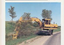Bageri na kotačima Caterpillar 214B FT