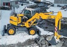 Bageri na kotačima Liebherr A 311 Litronic