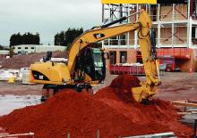 Bageri na kotačima Caterpillar M313D