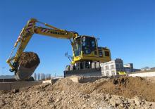 Bageri na kotačima Komatsu PW180-10