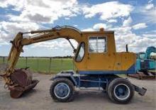 Bageri na kotačima Komatsu PW60-1