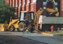 Rovokopači-utovarivači John Deere Construction 410 E