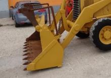 Rovokopači-utovarivači Caterpillar 428 B 4x4 Tele