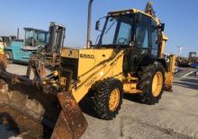 Rovokopači-utovarivači New Holland 655 D 4WD