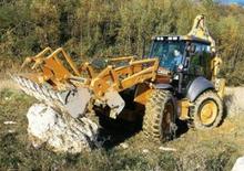 Rovokopači-utovarivači Case 695