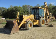 Rovokopači-utovarivači John Deere Construction 710 D
