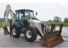 Rovokopači-utovarivači Terex 970