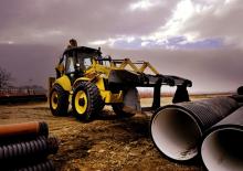 Rovokopači-utovarivači New Holland B115B