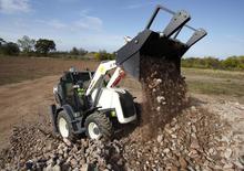 Rovokopači-utovarivači Terex TLB 890