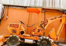 Rovokopači-utovarivači Komatsu WB 04