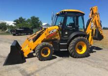 Rovokopači-utovarivači Komatsu WB95