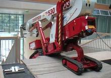 Teleskopska podizna platforma na gusjenicama Worldlift Industries AS - Rothlehner FS 290