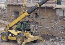 Teleskopski utovarivači Caterpillar TH 83