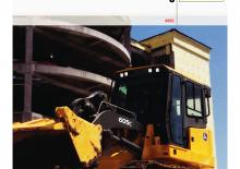 Utovarivači gusjeničari John Deere Construction 605 C