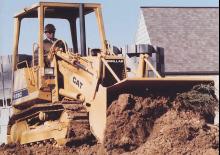 Utovarivači gusjeničari Caterpillar 935C