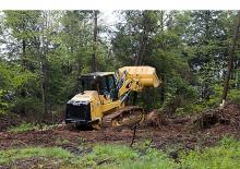 Utovarivači gusjeničari Caterpillar 973D