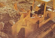 Utovarivači gusjeničari John Deere Construction JD850