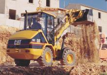 Utovarivači na kotačima Caterpillar 902