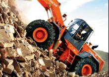 Utovarivači na kotačima Hitachi LX 210 E