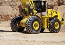 Utovarivači na kotačima New Holland W 230 Evolution