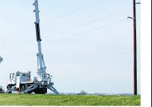 Dizala sa zglobnom granom montirana na prikolicu Altec AH100A