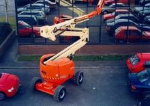 Zglobna podizna platforma na kotačima JLG 450A Semi Track